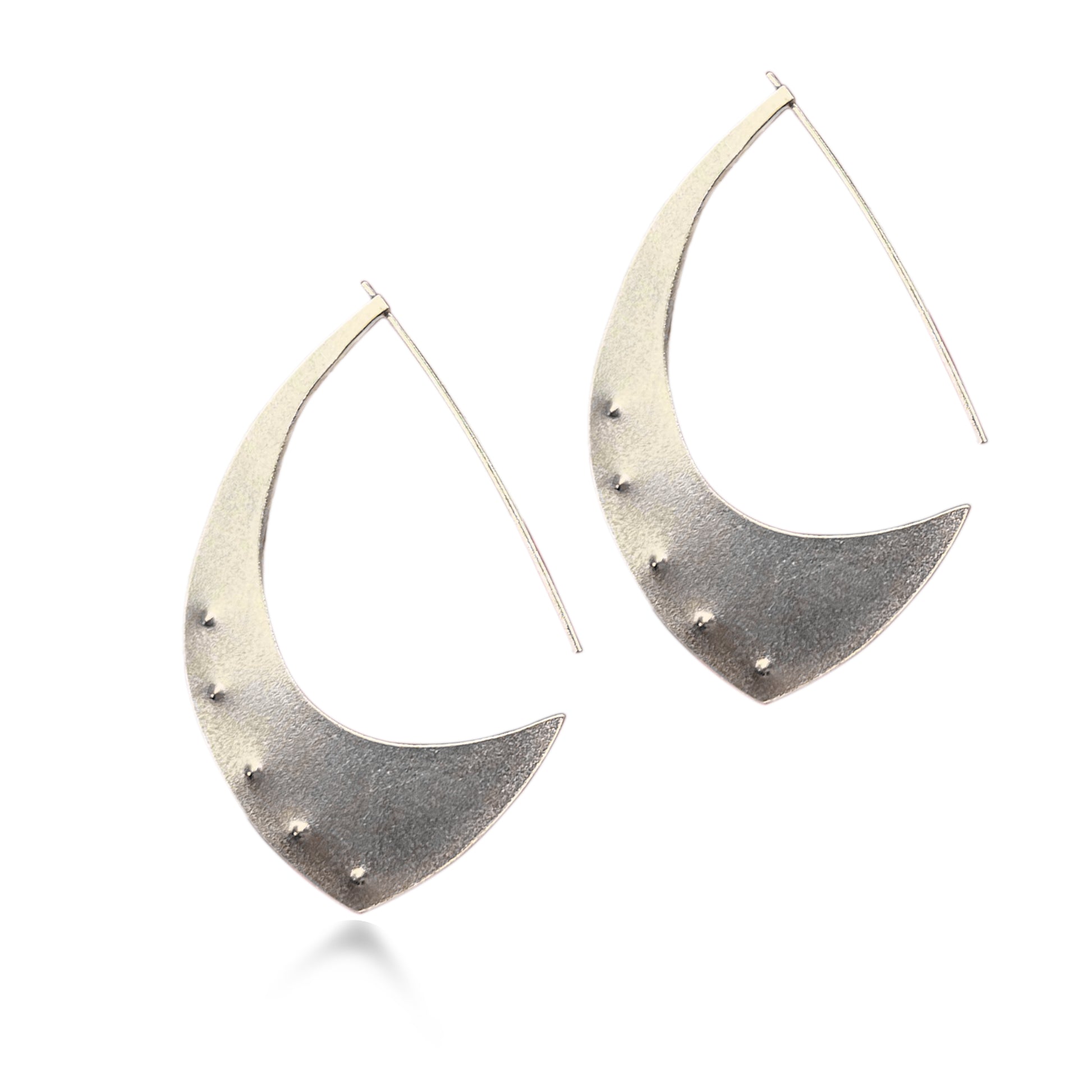 The Aubergine Sterling Silver Hoop Earrings are the perfect size. When you put them on, the only time you will notice them is when you look in the mirror, because they are surprisingly lightweight. Fabricated from recycled sterling silver.  FEATURES  º Hand fabricated in recycled sterling silver  º Soft brushed cashmere finish  º 2" total length