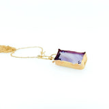 Susan Crow Studio Emerald cut Amethyst set in 14kt yellow gold. Lariat style in a 22" drop pendant. Hand made by designer.