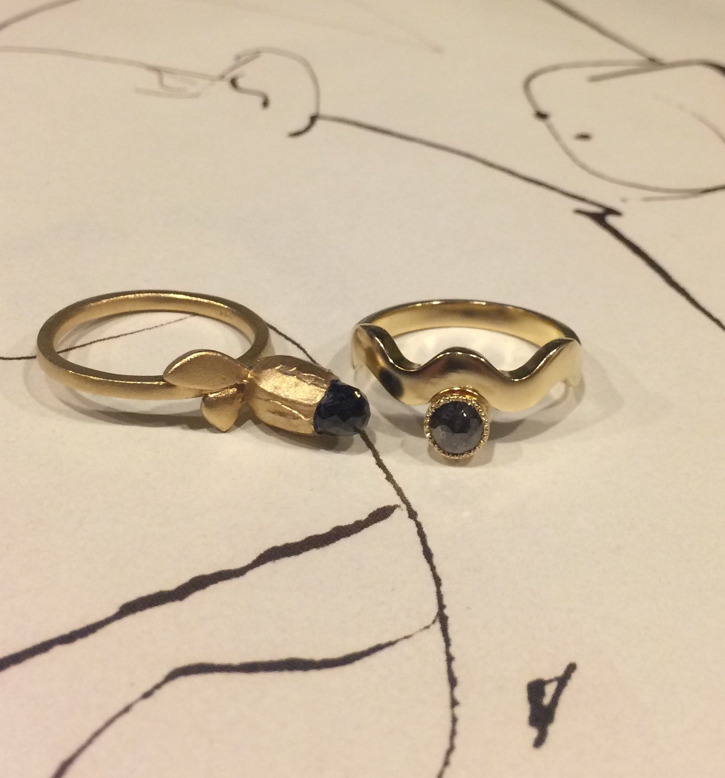 2 rings shown together - Black spinel and 14kt yellow gold Flora Ring and Black diamond Wave Ring