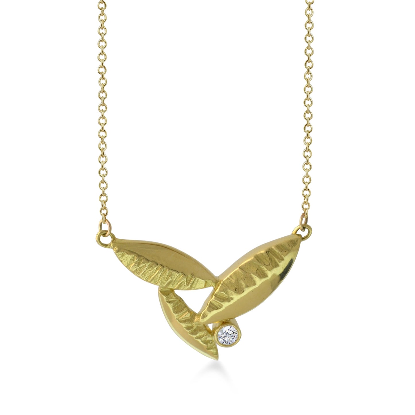Susan Crow Studio's 18kt Fairmined yellow gold and diamond pendant is the perfect size for a diamond Flora Leaf Pendant. Hand carved and cast in their Minnesota studio.
