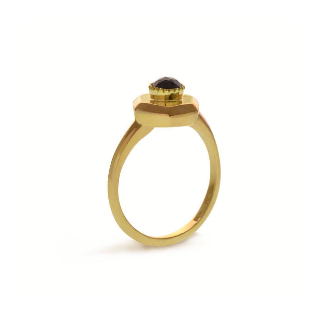 Original designed ring by Susan Crow for East Fourth Street Jewelry. 14kt recycled yellow gold with round salt and pepper diamond.