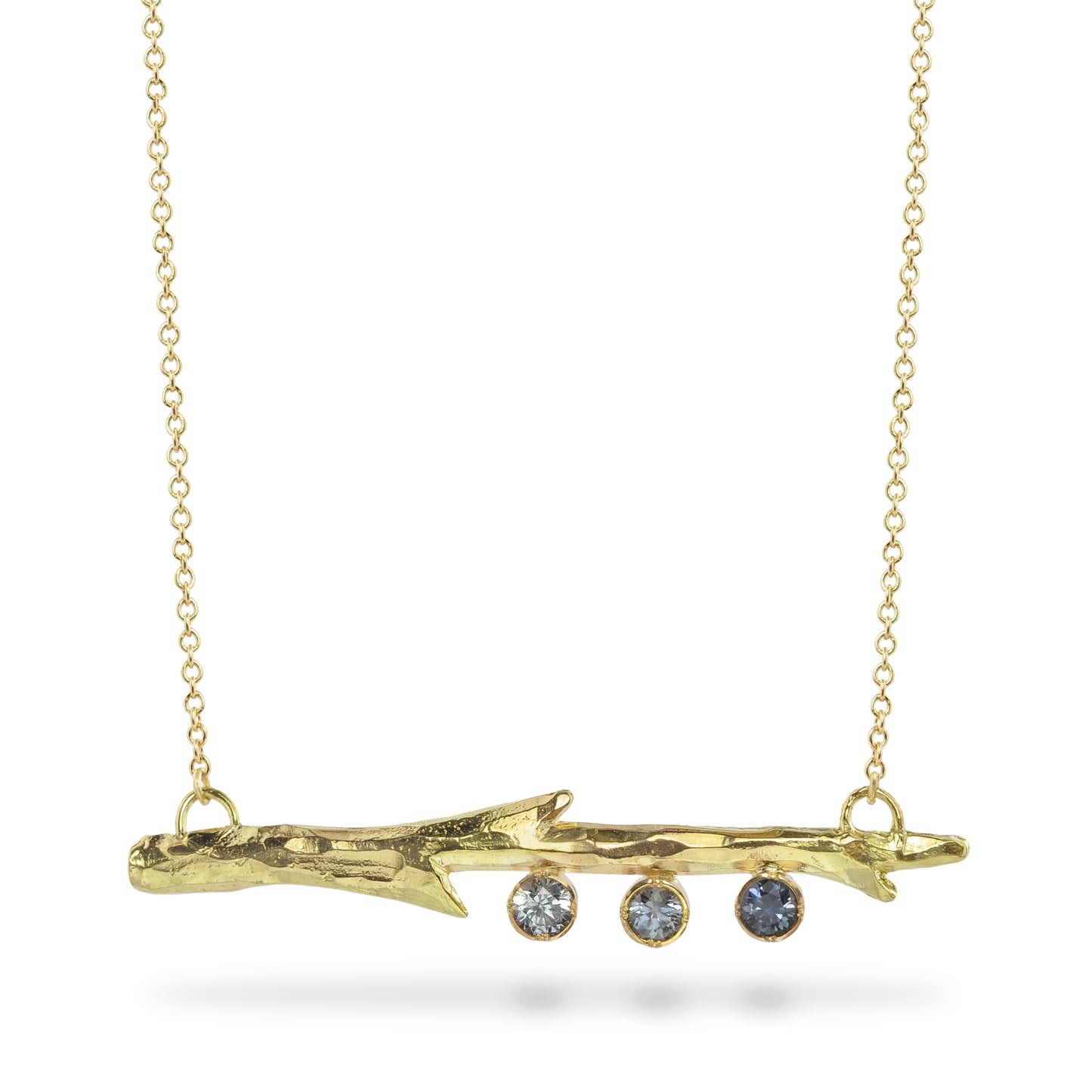 Montana sapphires and 18kt Fairmined yellow gold Pendant by East Fourth Street Jewelry. Hand carved and cast in our Minnesota studio.