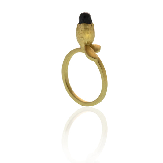 Flora Leaf Ring is made from 14kt yellow gold and set with a Black Spinel gemstone. Soft cashmere brushed finish. Available to ship in a size 7. Side View