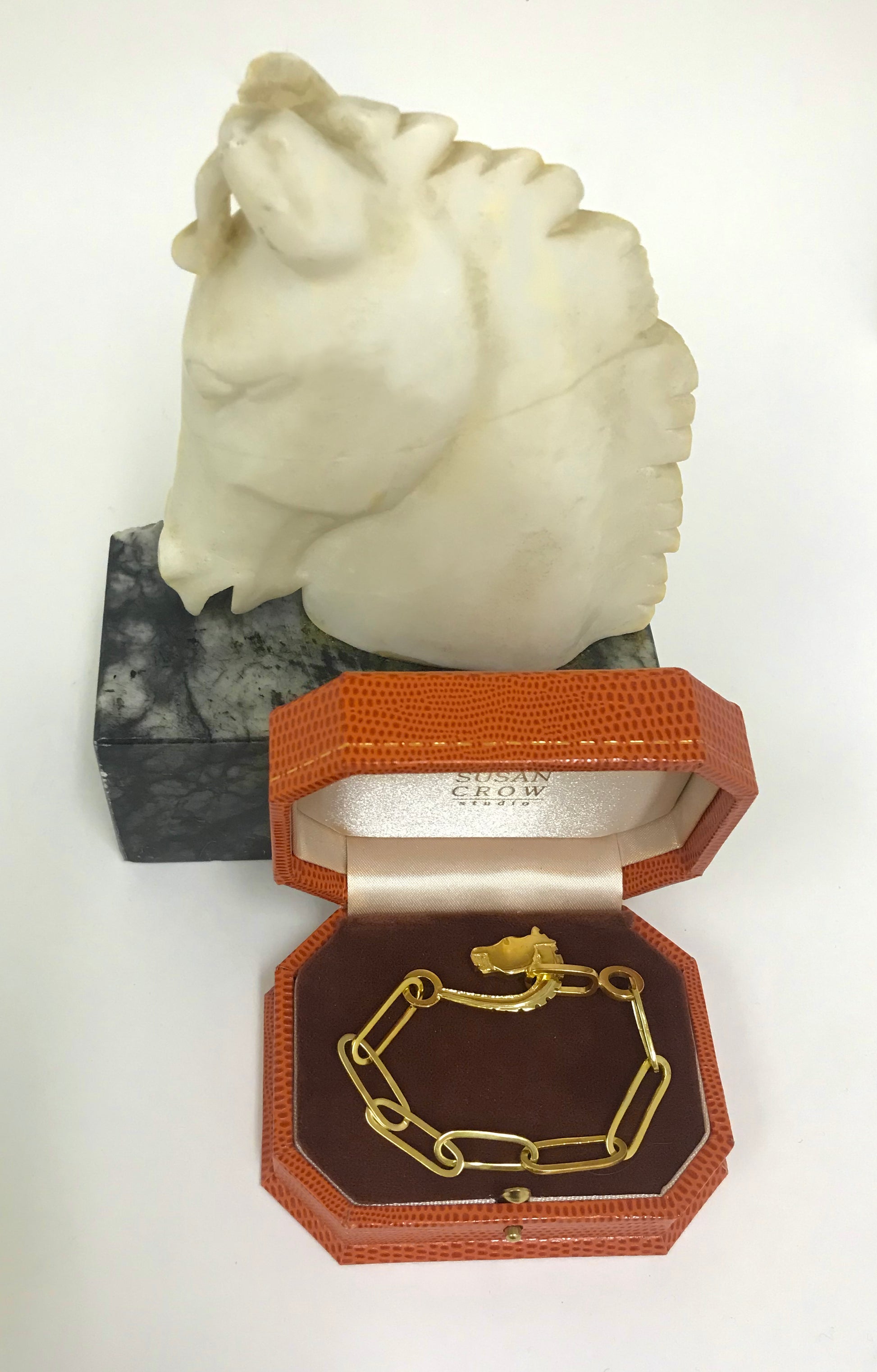 Inspired by the ancient Greek Medici horse head from the 4th century BC. Ourelongated link bracelet is fabricated, hand carved and cast in solid 18kt Fairmined yellow gold.

Individually hand shaped links are elevated by their gold weight – coming together with our one-of-a-kind Horse clasp.

Small, fits wrists up to 6.25" in circumference. If you require a medium, please contact the studio for sizing and pricing.

Designed and made by Susan Crow.