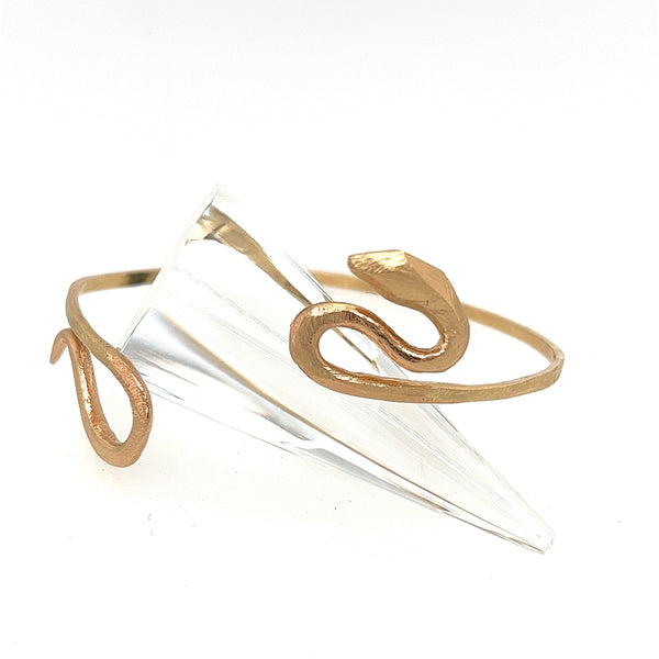 14kt yellow gold Snake bracelet designed and made by Susan Crow Studio. Snake gently wraps around your wrist.