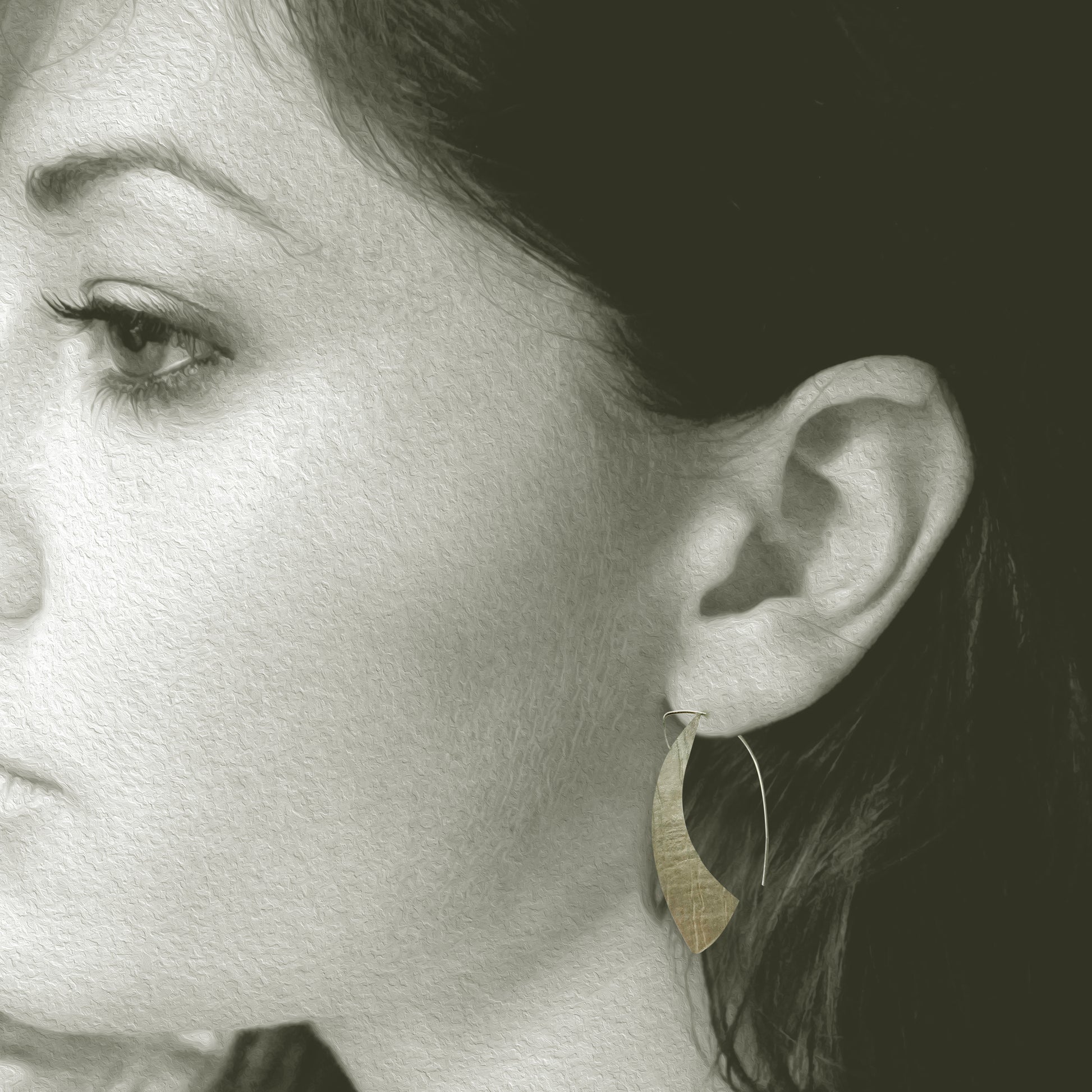 Our Sterling Silver Silhouette Hoop Earrings are a contemporary take on a classic look. Hand crafted in recycled sterling silver, these lightweight and comfortable earrings offer a beautiful snapshot of your personal style.

A must-have for everyday wear, their 1.5" long x 1" wide size ensures they stay perfectly in place, framing your face with effortless elegance. Allow 2-4 weeks for delivery, but if you have to have them sooner, please contact the studio and we will see if we can accommodate you. 