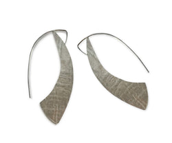 Our Sterling Silver Silhouette Hoop Earrings are a contemporary take on a classic look. Hand crafted in recycled sterling silver, these lightweight and comfortable earrings offer a beautiful snapshot of your personal style.

A must-have for everyday wear, their 1.5