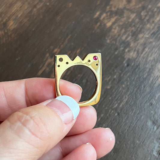 Our Flat Ring Collection was&nbsp;designed to be different - and to help us appreciate what is important in life, simplicity and the beauty of life itself. 

Based simply on the unadulterated love for design, minimalism and luxury.

The gemstone  in the Square Flat Ring ;is set through instead of on top so it catchs the light and your eye when you move your hands.
