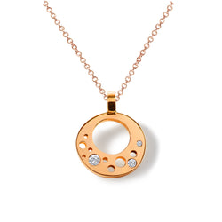 Crafted in 14kt certified recycled rose gold and reclaimed diamonds, the CIRCLE_INFINITE Pendant tells its own story of 'Less is More' when it comes to beauty and sophistication. 
Minimalism and functionality blend with industrial simplicity, mechanically and aesthetically, creating a symbiotic relationship – evident in this contemporary pendant.

Pendant is handcrafted in Minnesota with 14kt certified recycled gold and comes with an 18