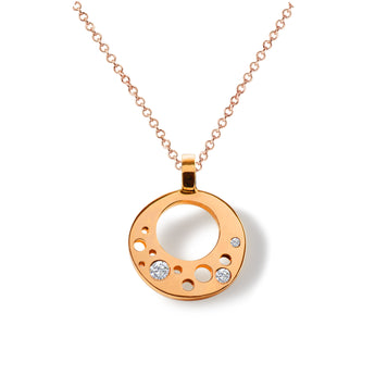 Crafted in 14kt certified recycled rose gold and reclaimed diamonds, the CIRCLE_INFINITE Pendant tells its own story of 'Less is More' when it comes to beauty and sophistication. 
Minimalism and functionality blend with industrial simplicity, mechanically and aesthetically, creating a symbiotic relationship – evident in this contemporary pendant.

Pendant is handcrafted in Minnesota with 14kt certified recycled gold and comes with an 18