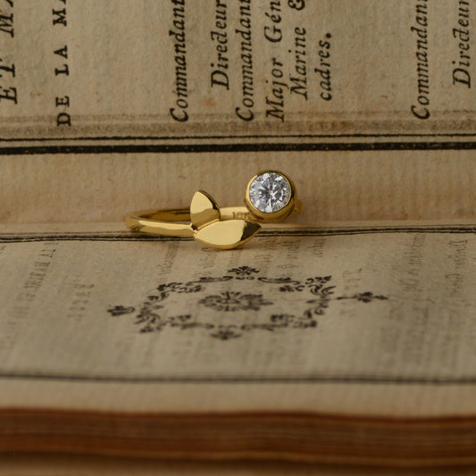 Flora Leaf diamond ring in 18kt yellow gold styled with book, alternative engagement ring"