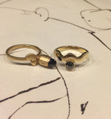 2 rings shown together - Black spinel and 14kt yellow gold Flora Ring and Black diamond Wave Ring