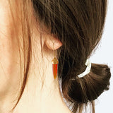 Earrings by Susan Crow Studio, Bullet shaped carnelians in a hand carved and cast recycled 14kt yellow gold drop earrings, one of a kind. 1" long.