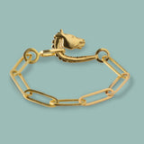Inspired by the ancient Greek Medici horse head from the 4th century BC. Ourelongated link bracelet is fabricated, hand carved and cast in solid 18kt Fairmined yellow gold.

Individually hand shaped links are elevated by their gold weight – coming together with our one-of-a-kind Horse clasp.

Small, fits wrists up to 6.25" in circumference. If you require a medium, please contact the studio for sizing and pricing.

Designed and made by Susan Crow.