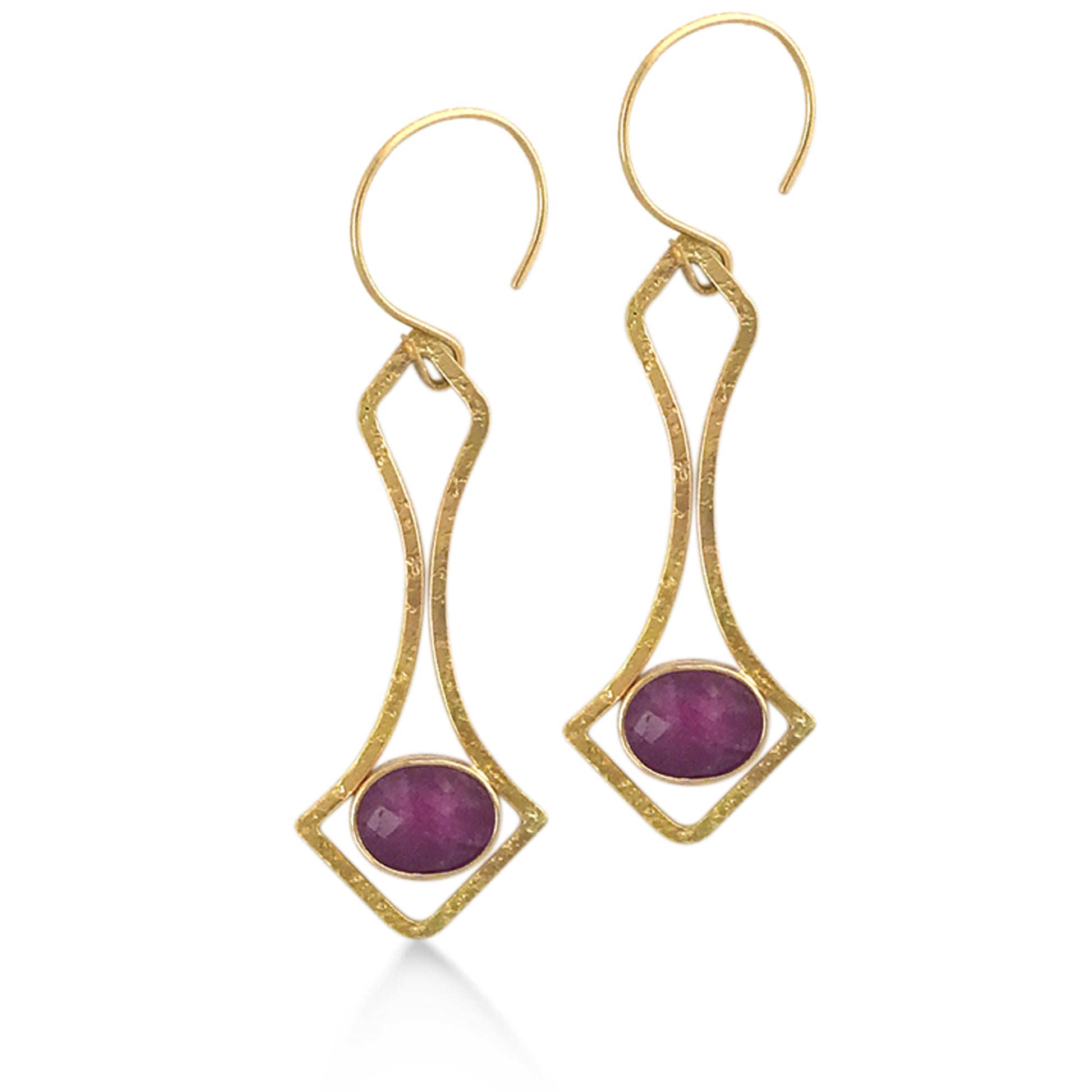 Oval rose-cut rubies are  bezel set in our 18kt Fairmined yellow gold earrings. With a fine jewelry drop earring of this precedence, these earrings are a showstopper.  2" long from lobe to Rubies.  (2) 9mm x 7mm African rose-cut rubies. 3.72tcw.. Round French style wire that balances and rides well in your earlobe. One-of-a-kind - only 1 pair available.