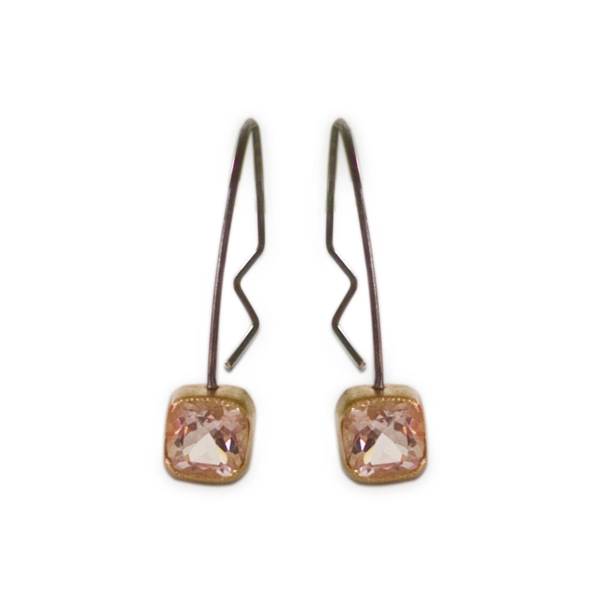 Part of our silver collection, these genuine Morganite Hoop Earrings offer an alternative artistic impression. Pink sparkling Morganite gemstones bezel set in 18kt yellow gold with sterling silver hoops.
