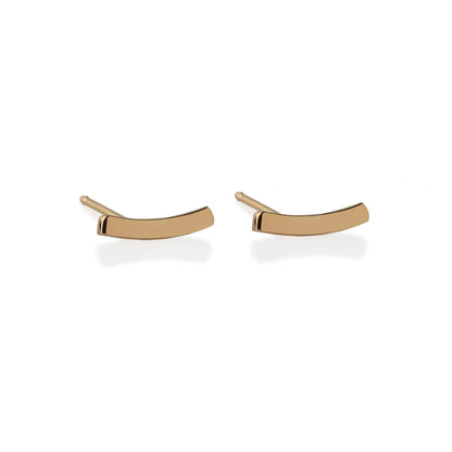 Slight Gold Earrings: Post earrings made in 14kt yellow gold. 3/8" long x 1/8" wide. 