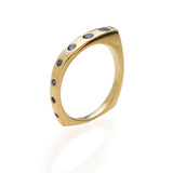 East Fourth Street Jewelry, responsibly sourced blue sapphires set into unique, modern gold ring. 