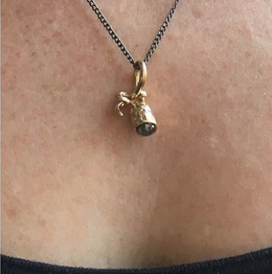 Pod Pendant shown on model for scale