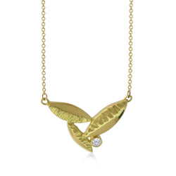 Susan Crow Studio's 18kt Fairmined yellow gold and diamond pendant is the perfect size for a diamond Flora Leaf Pendant. Hand carved and cast in their Minnesota studio.