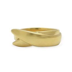 The Embrace + 2  ring is our sensual response to the overlapping loving commitment in a relationship. Embrace yourself and Embrace your special person with matching rings that tell your story of love.  FEATURES:  º Softly sculpted design.  º Hand-carved and cast in recycled or Fairmined gold.   º 7mm wide at the top  º Comfortable inside fit  º Cashmere brushed finish.