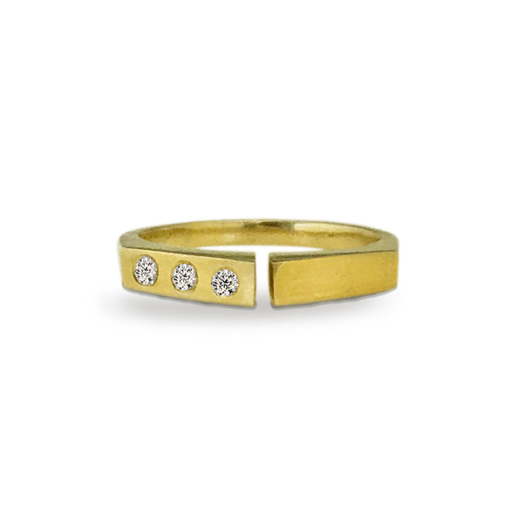 East Fourth Street Jewelry Diamond Divide Ring in 18kt Fairmined yellow gold and 3 round flush set diamonds. Low profile, comfortable fit.