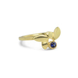 East Fourth Street Jewelry, responsibly sourced blue sapphire and 18kt Fairmined yellow gold ring. Modern Leaf design is hand carved and cast by designer Susan Crow..