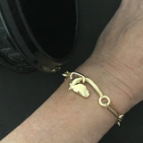 Inspired by the ancient Greek Medici horse head from the 4th century BC. Ourelongated link bracelet is fabricated, hand carved and cast in solid 18kt Fairmined yellow gold.

Individually hand shaped links are elevated by their gold weight – coming together with our one-of-a-kind Horse clasp.

Small, fits wrists up to 6.25" in circumference. If you require a medium, please contact the studio for sizing and pricing.

Designed and made by Susan Crow.